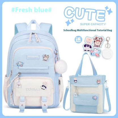 Pink girls school backpack with curved shoulder straps on a wooden floor
