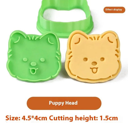 Three-dimensional puppy biscuit mould showing raised details for creating themed baked goods with seven design options