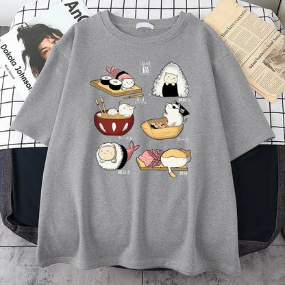 Man wearing a black loose-fit cotton t-shirt with a colourful cute cat sushi cartoon print on the front.