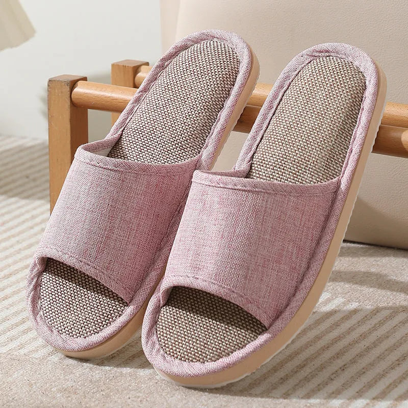 Women's open-toe linen slippers with thick sole in light brown colour.