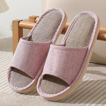 Women's open-toe linen slippers with thick sole in light brown colour.