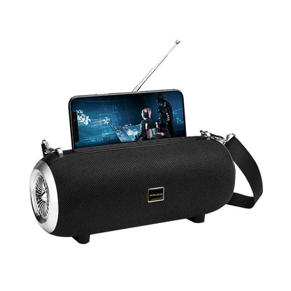 F666 portable mini Bluetooth speaker in fabric mesh with shoulder strap and extended FM antenna.
