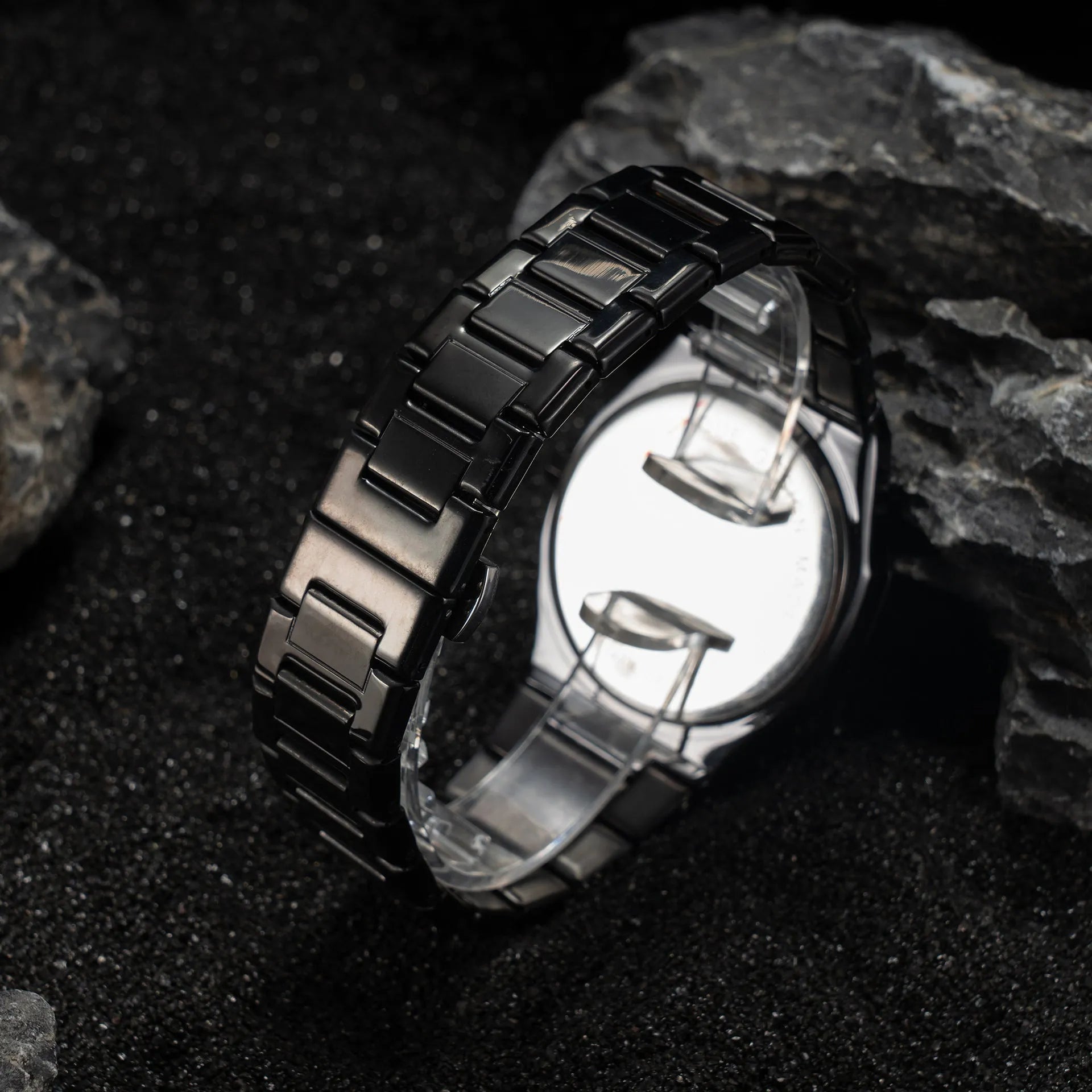 Men's business casual quartz watch with steel belt in black and silver colours, showing 10mm thick case.