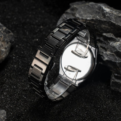 Men's business casual quartz watch with steel belt in black and silver colours, showing 10mm thick case.