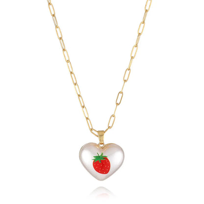 Geometric fruit heart pendant necklace on an adjustable chain, showing strawberry, pineapple, apple, pear, and cherry design options.