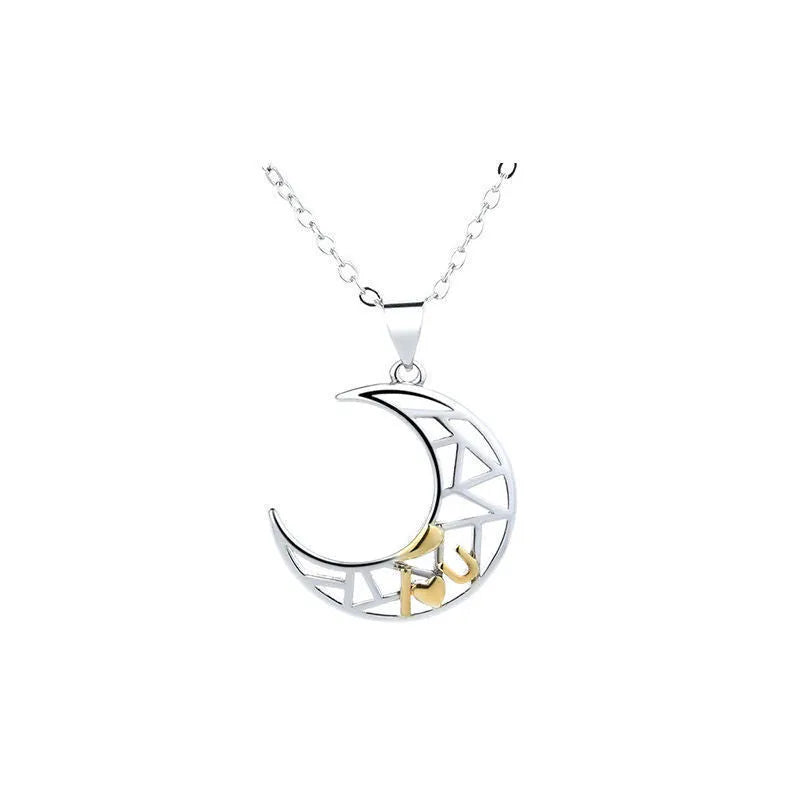 Sun and Moon copper couple's necklaces on a dark background, showing the detailed 4.5cm pendants and cross chain.