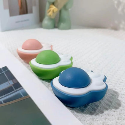 Blue catnip ball toy with textured surface for cats to lick and chew, shown next to a tape measure displaying its 45mm length.