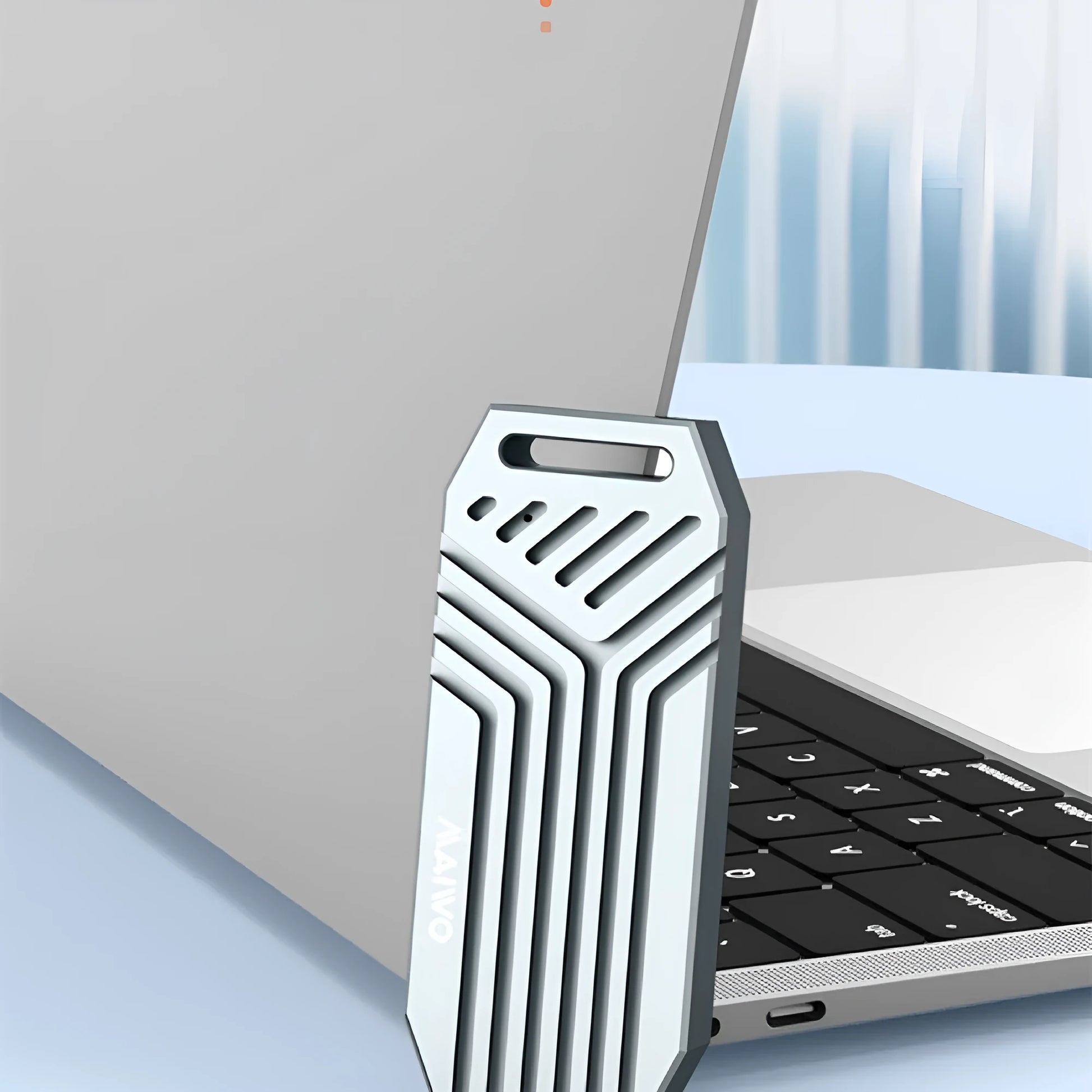 Silver aluminium Thunderbolt 4 external case for M.2 NVMe SSD with cooling fan vent