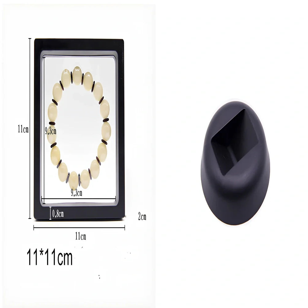 Black 11x11cm suspended 3D floating display frame holding a coin, with square base for stable collectible showcase