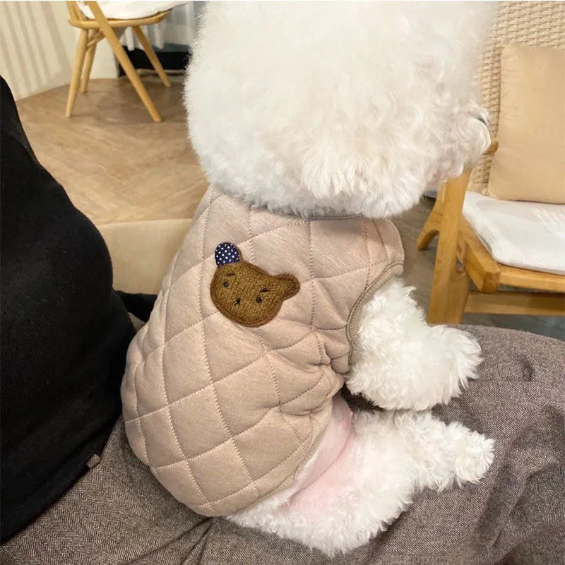 Quilted pet vest for small dogs with bear patch and polka-dot ears, padded dog gilet in cream or beige, sizes XS to XL.