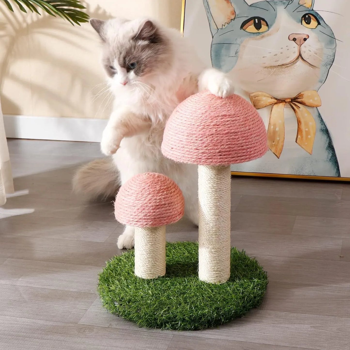 Pink mushroom-shaped cat scratching post with natural sisal caps and pole for small cats.