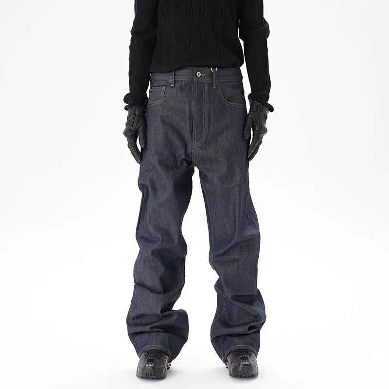 Men's dark blue loose straight-leg denim jeans laid flat, showing front view.