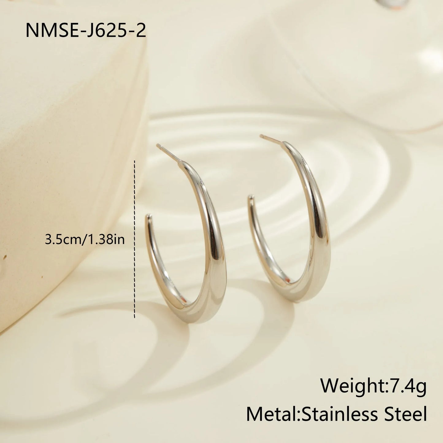 Titanium steel geometric round hoop earrings with 18K gold plating available in large and small sizes