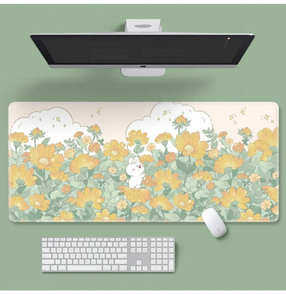 Large cartoon flower pattern mouse pad with non-slip rubber base on desk
