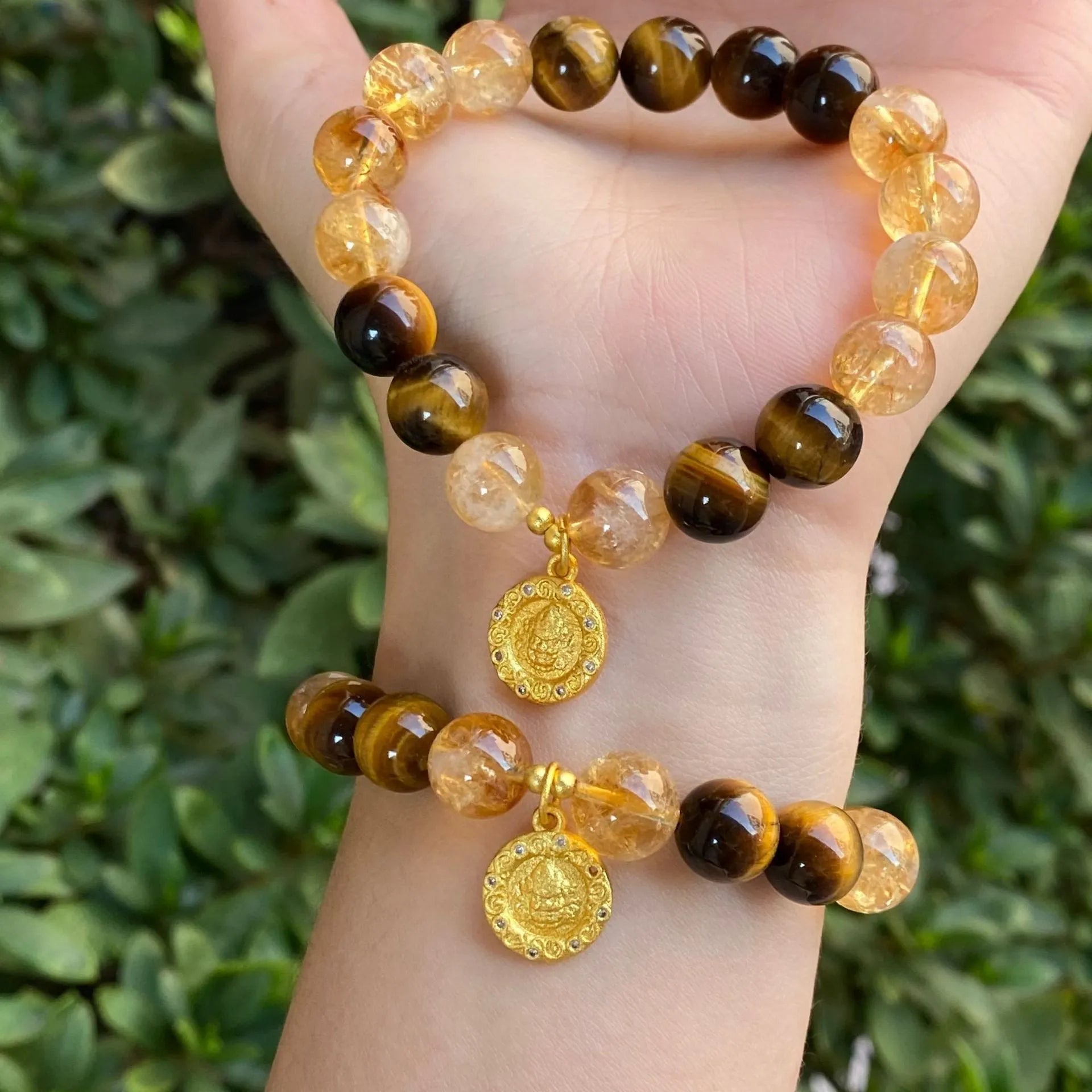 Handmade unisex crystal bracelet with a diamond gourd charm and assorted 10mm and 8mm beads.