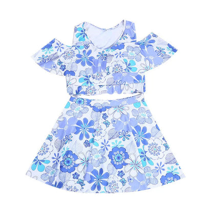 Women's fresh floral blue one-piece swimsuit dress showing front view