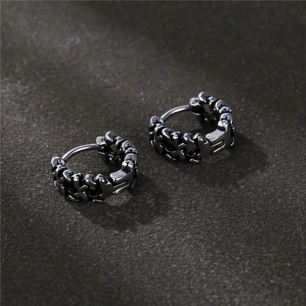 Men's geometric copper hip-hop earrings on a flat surface, showing 10mm and 14mm size options.