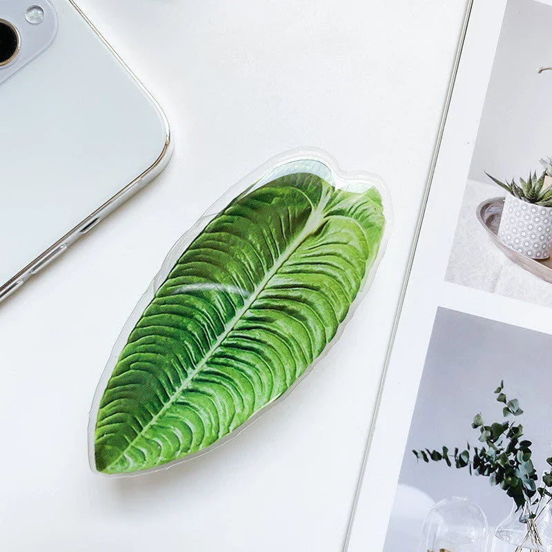 Stylish smartphone stand with leaf-inspired design for secure hands-free support and mobile device versatility