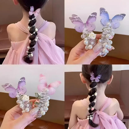 Colourful butterfly and pearl elastic hair band for children on a white background.