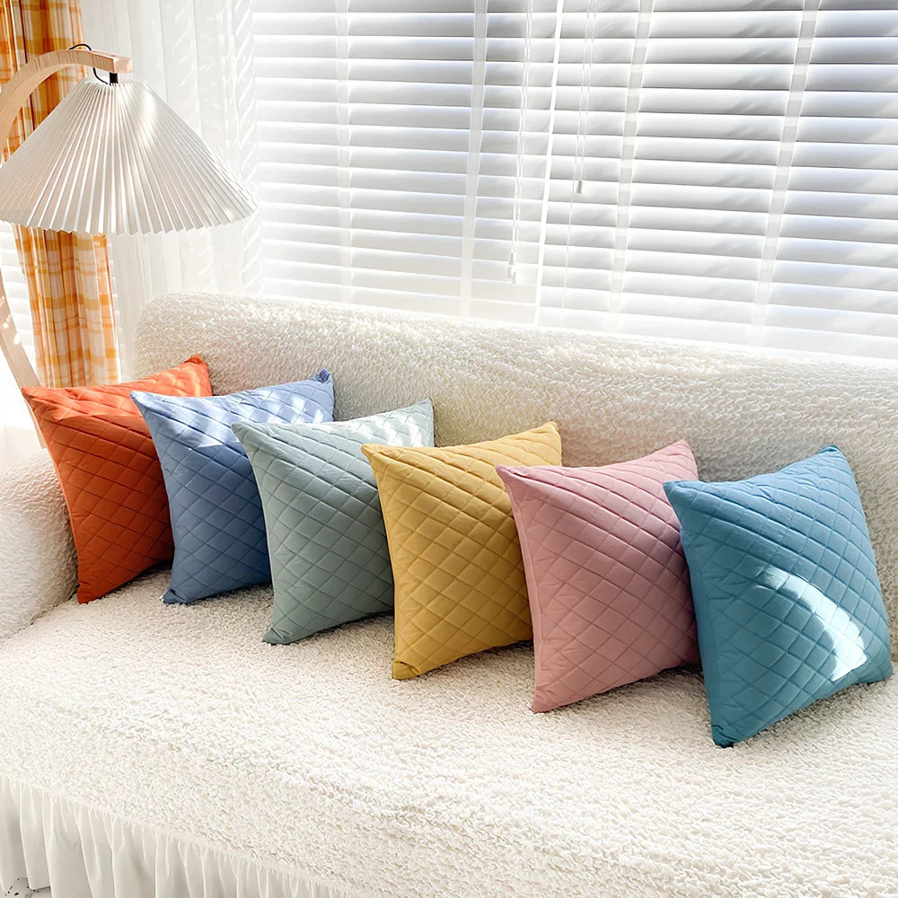 45cm square velvet cushion in Gentleman's Grid colour with PP cotton filler on grey sofa