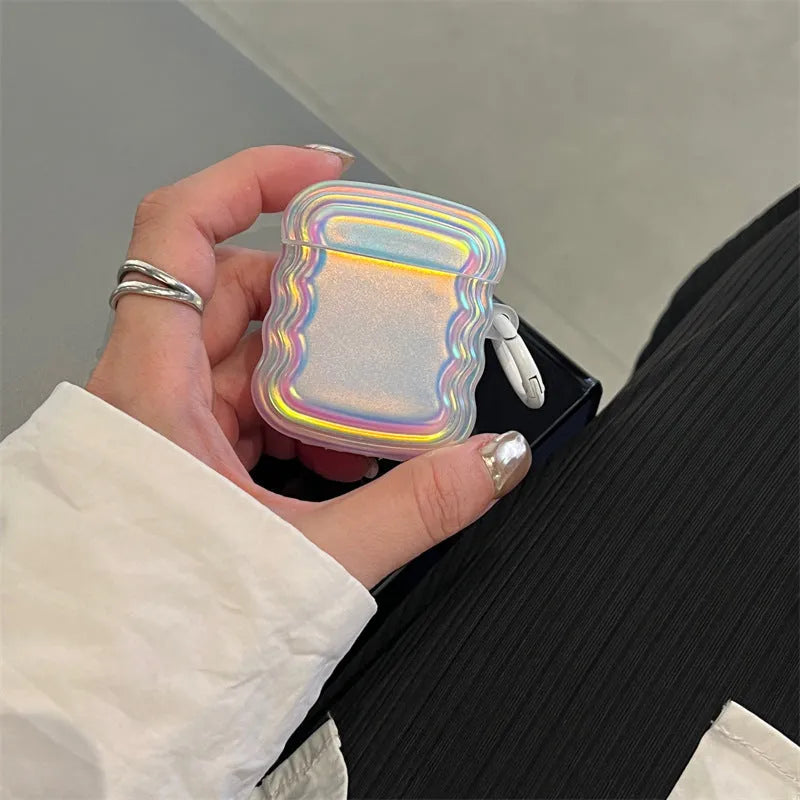 Colourful magic laser ring silicone protective case for Apple AirPods on a white background.
