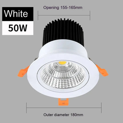 Modern aluminium recessed LED ceiling spotlight with three colour temperature settings shown installed.
