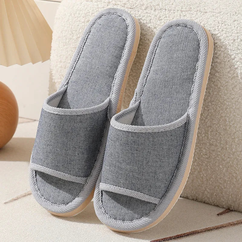 Women's open-toe linen slippers with thick sole in light brown colour.