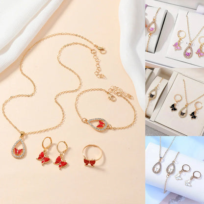 Women's 4PCS Butterfly Jewelry Set with diamond accents in red, pink, white, and black