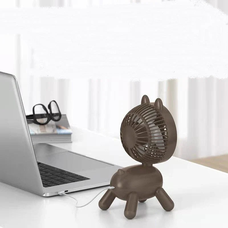 Compact portable USB-powered desktop cooling fan with adjustable airflow and shaking head