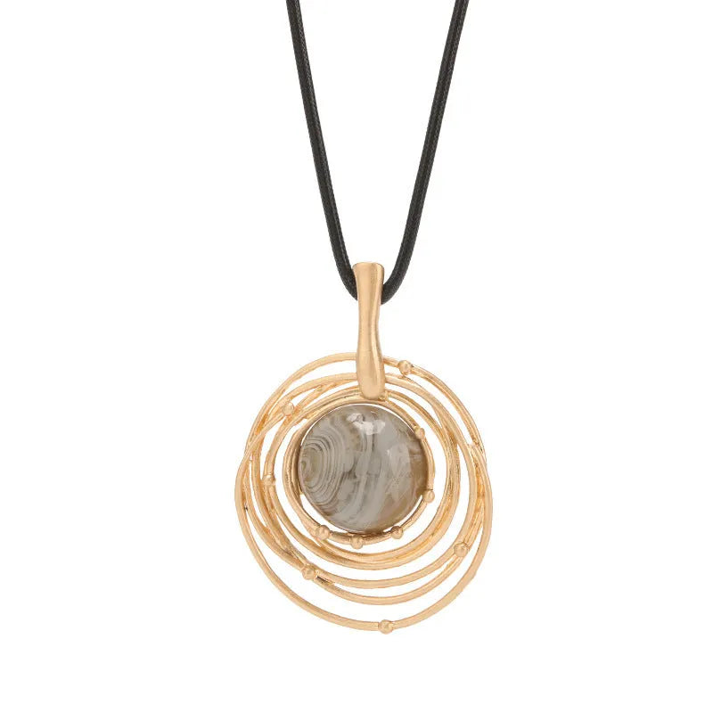 Gold geometric plaid pendant necklace on snakeskin wax rope chain with adjustable length