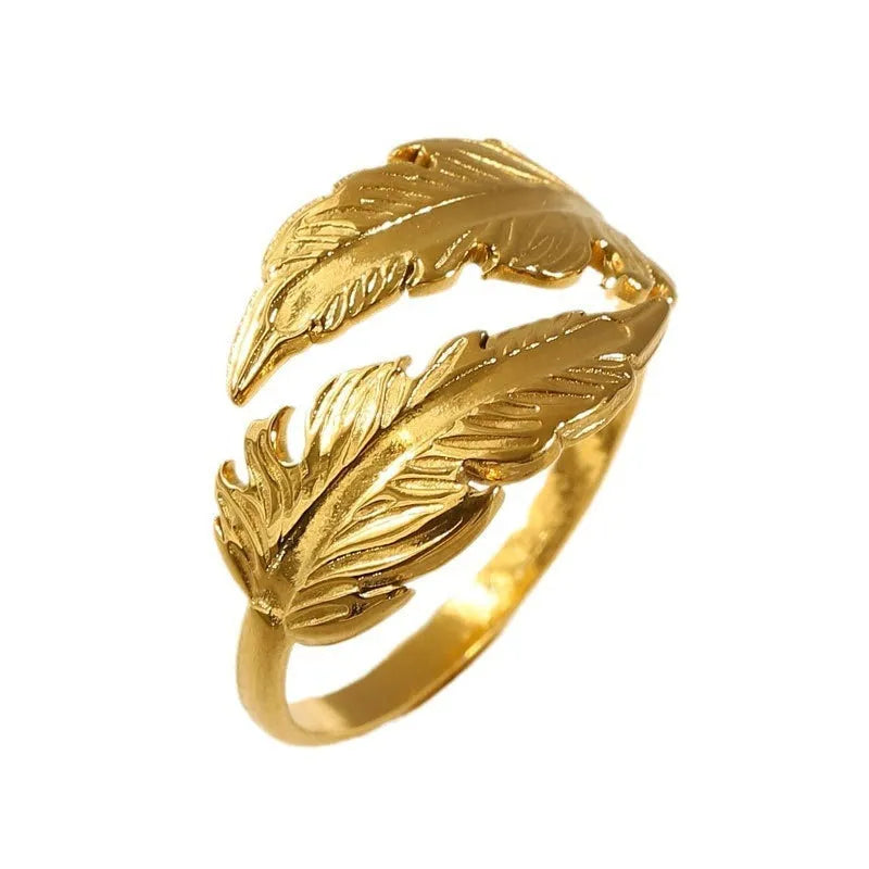 Women's stainless steel feather fashion ring with adjustable opening in silver or gold colour