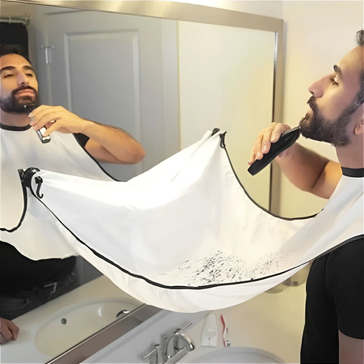 Professional transparent barber shaving cape with built-in tool tray and suction cup, shown in black.