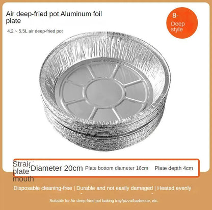 Round disposable aluminium foil liners for air fryers in four different sizes on a kitchen counter.