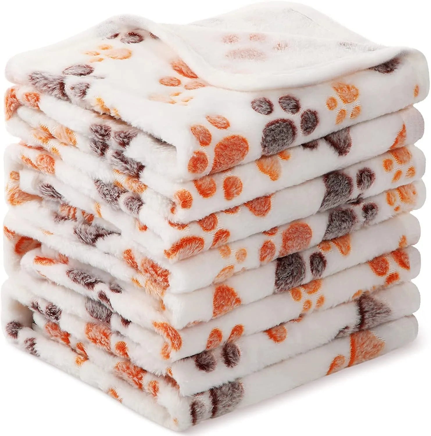 Coral fleece dog blanket with paw print pattern, shown in beige colour, laid flat to show size and soft texture.