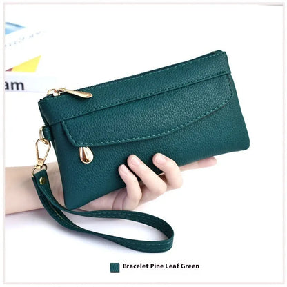 Soft surface square PU crossbody bag and clutch with internal zipper pocket in various colours.