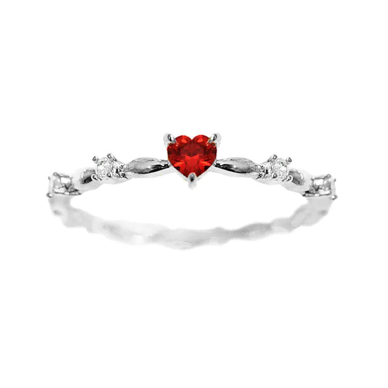 Gold and silver tone peach heart ring with zircon decoration, shown in sizes 6-10