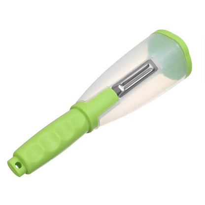 Green vegetable peeler with a transparent storage box attached, showing a stainless steel blade.