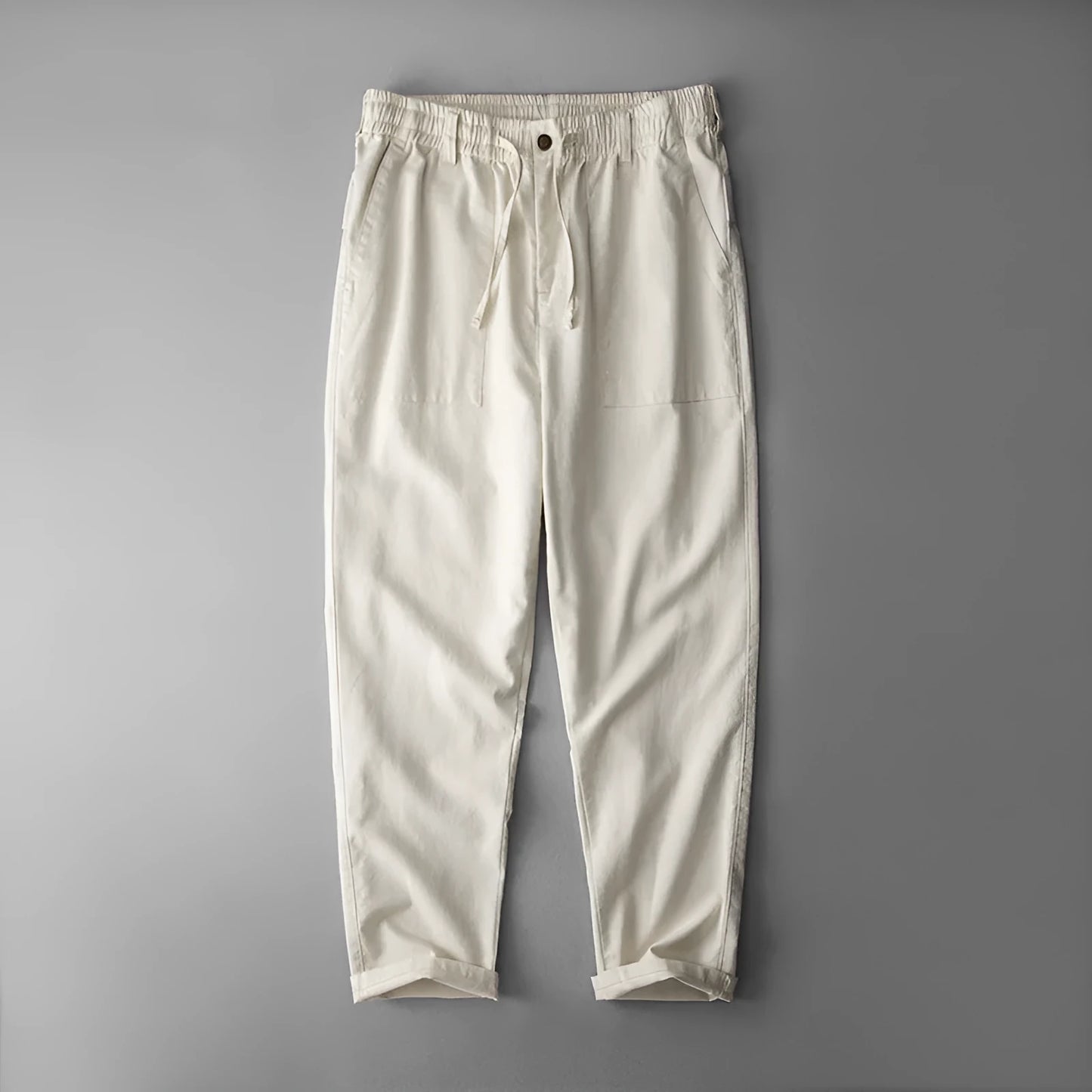 Men's solid colour linen trousers in mid-waist design available in three colours