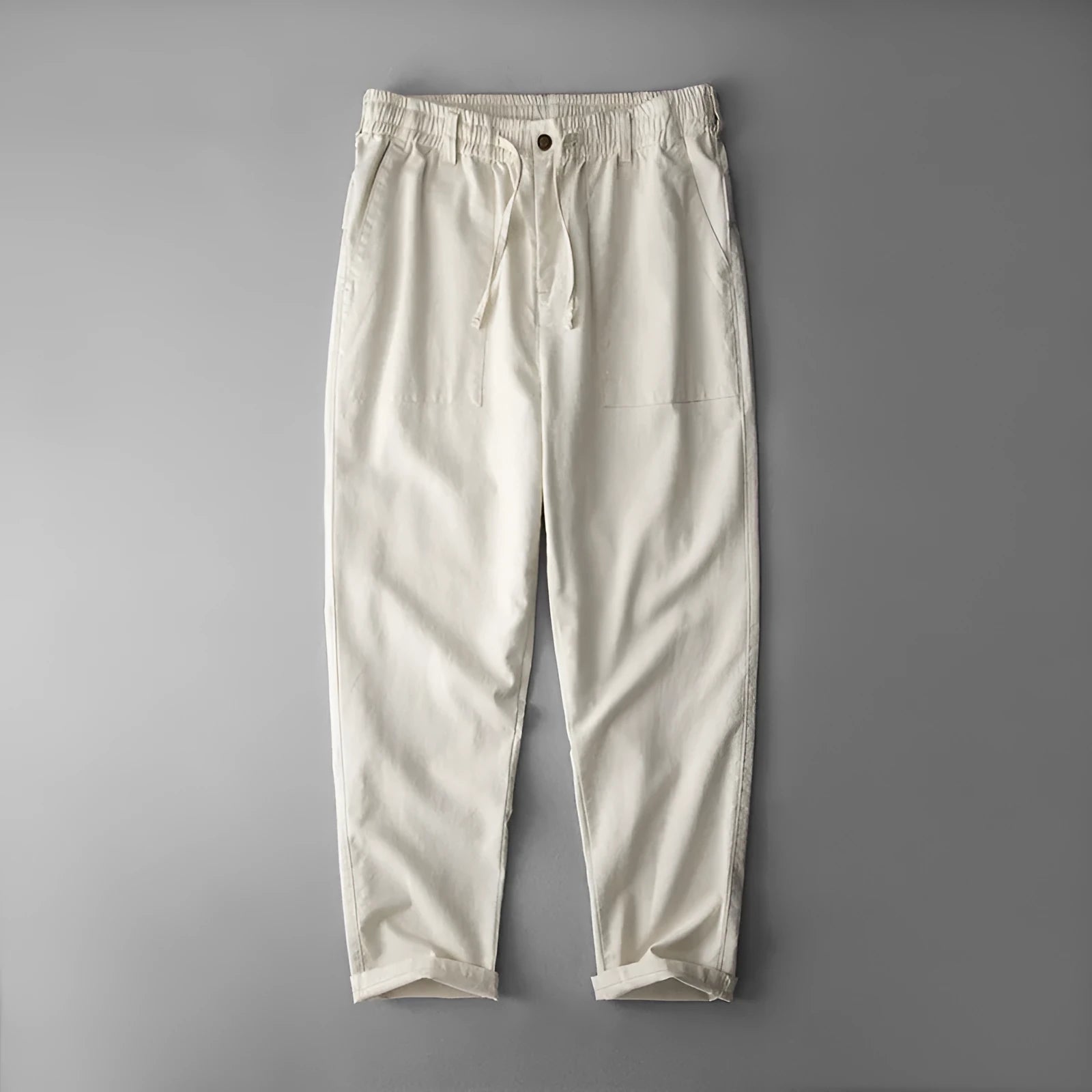 Men's solid colour linen trousers in mid-waist design available in three colours