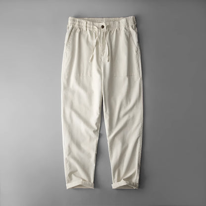 Men's solid colour linen trousers in mid-waist design available in three colours