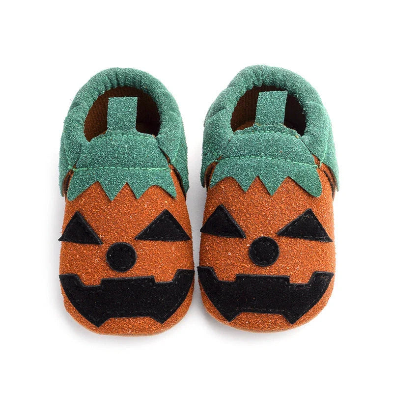 Pumpkin-themed costume shoes for toddlers and young children in various sizes and colours
