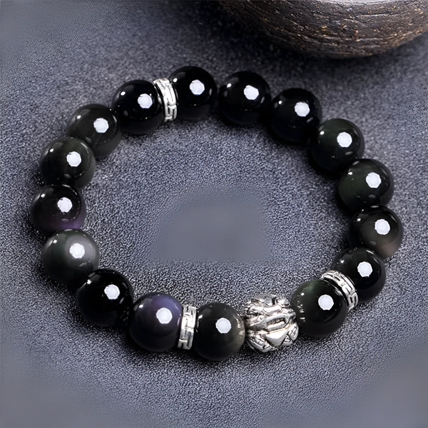 Silver 999 obsidian stone bracelet for men and women in 10mm and 12mm sizes.