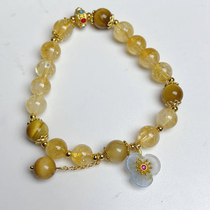 Citrine crystal bracelet with floral tassel design for women, handcrafted beadwork
