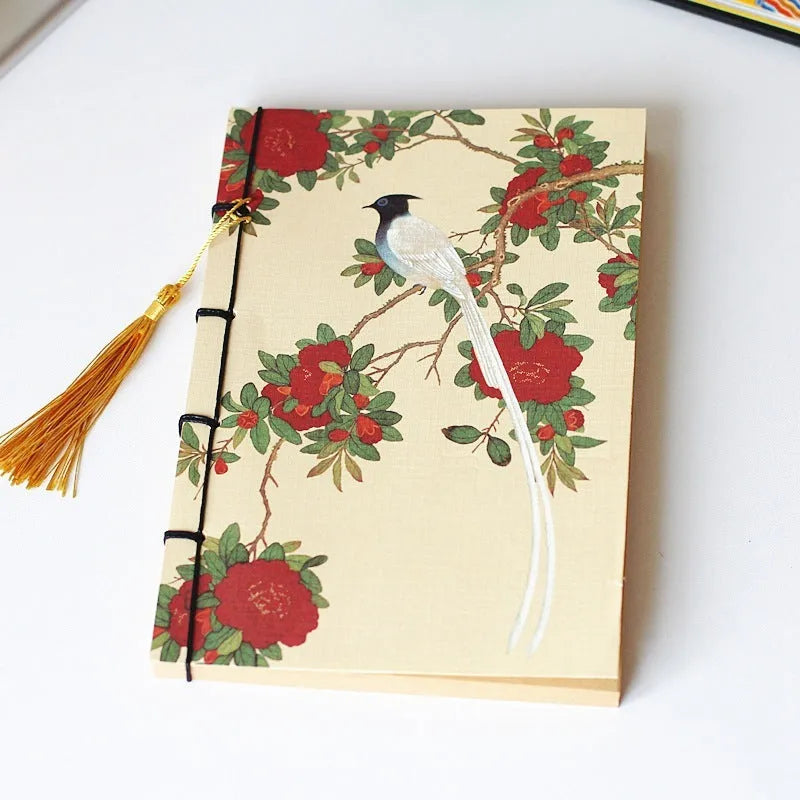A5 antique wire-bound notebook with classical artwork cover, black oil wax rope binding, and decorative tassels