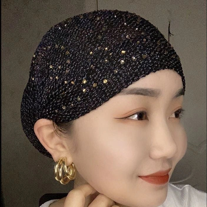Stylish knitted beanie cap with hollow-out pattern in various colors, perfect for keeping warm and fashionable in the UK