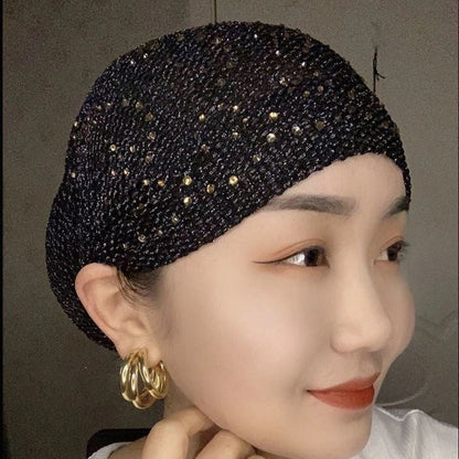 Stylish knitted beanie cap with hollow-out pattern in various colors, perfect for keeping warm and fashionable in the UK