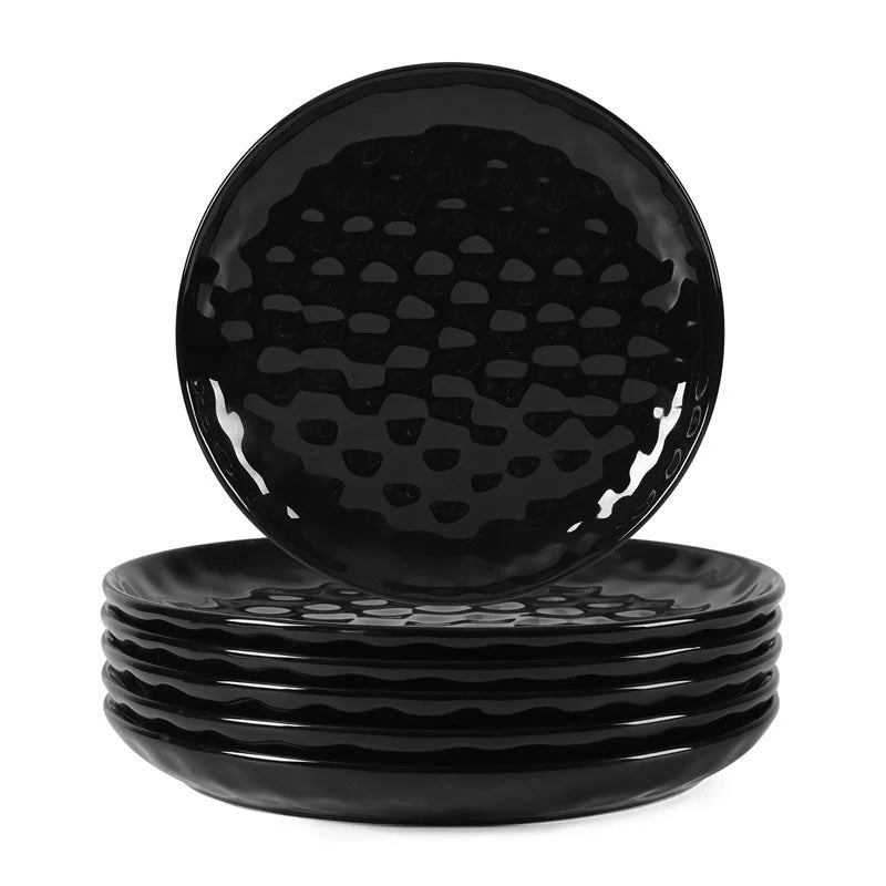 Elegant black ceramic dinner plate set with hammered design, perfect for parties and family dinners.