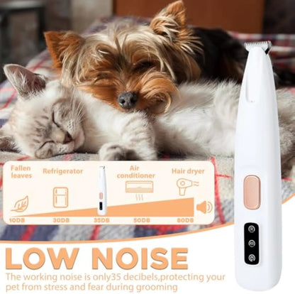 White rechargeable electric dog paw trimmer with LED light on a grey surface.