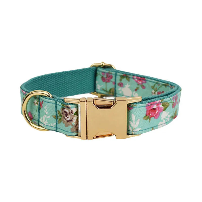 Dog collar with matching accessories in a rose and green colour scheme featuring a detachable fabric bow, cloth material, available in five sizes including XS, S, M, L, XL, and including a leash and vest for a coordinated pet accessory set