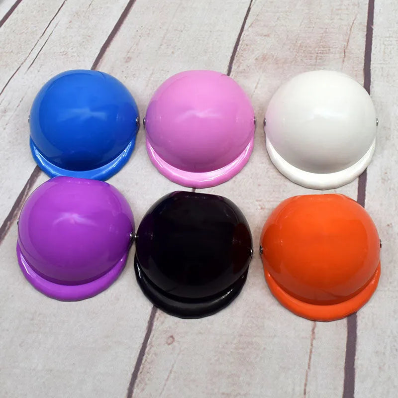 Dog motorcycle cap plastic helmet for small pets in Japanese South Korea style, solid colour design with paint surface treatment, available in pink white black yellow blue orange purplish red, sizes S 9.5cm M 12cm L 15cm diameter